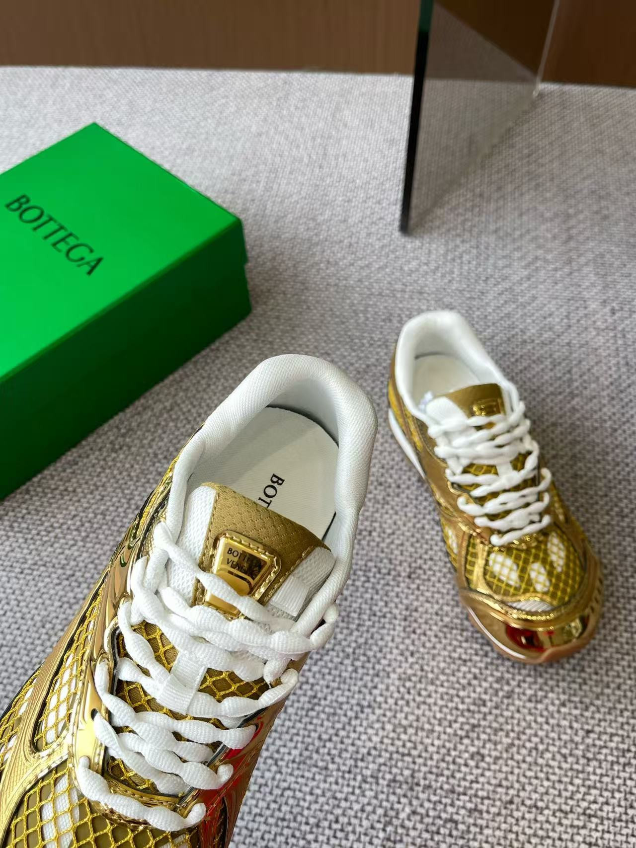 UA Bo*te*ga Ve*ne*ta Orbit Sneaker