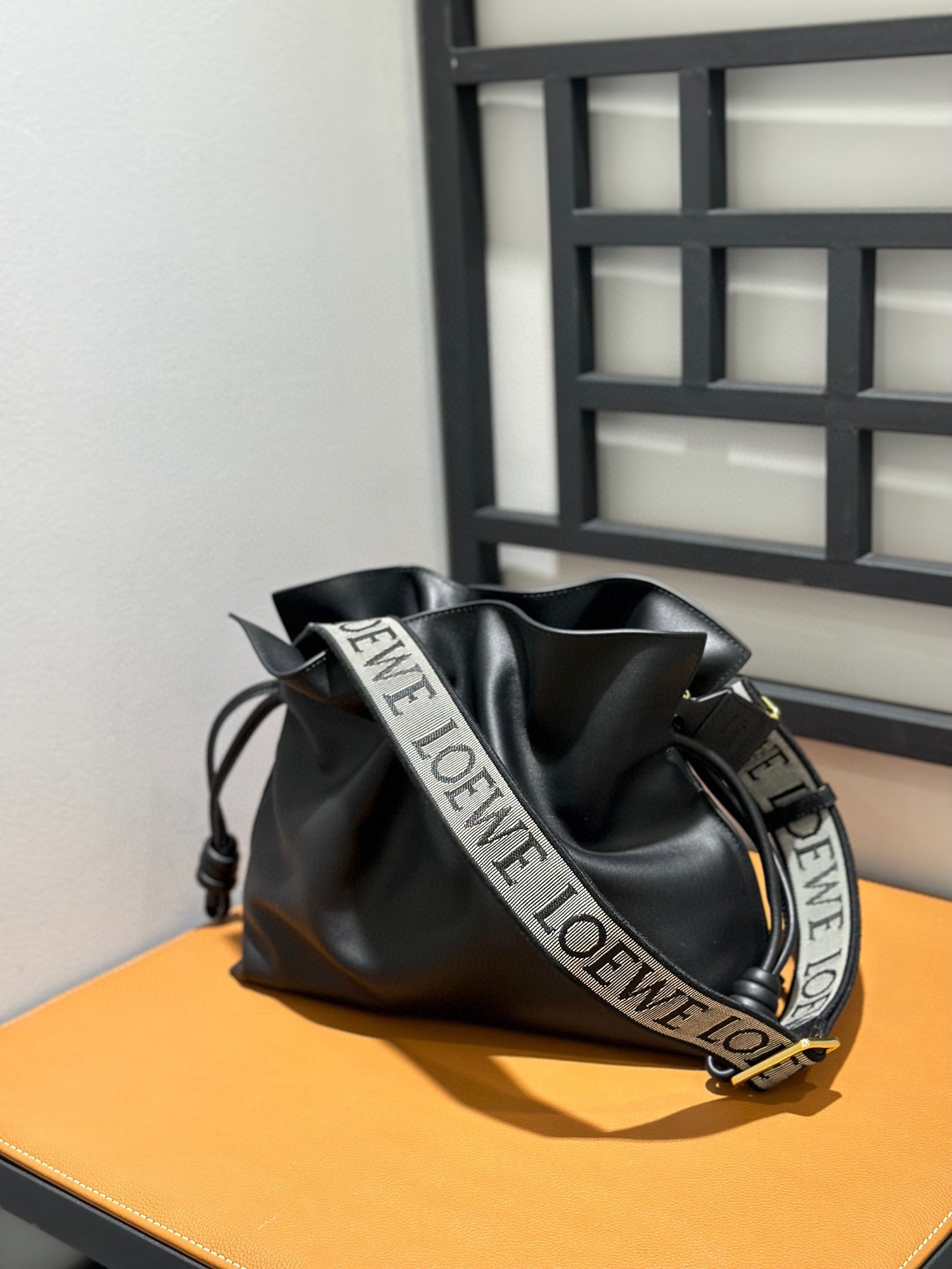 L0ew* Medium Flamenco clutch in nappa calfskin 30x24.5x10.5cm