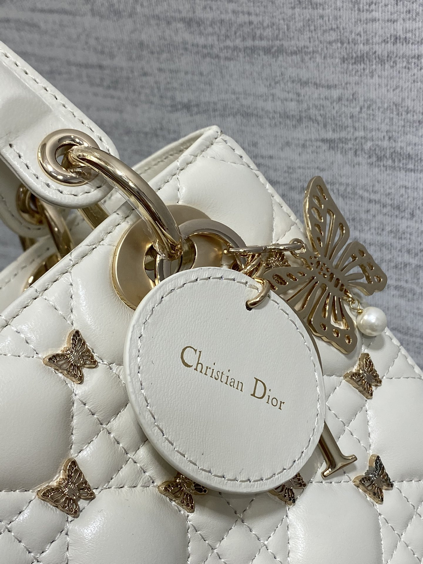 SMALL LADY D*0r White with Butterfly Studs