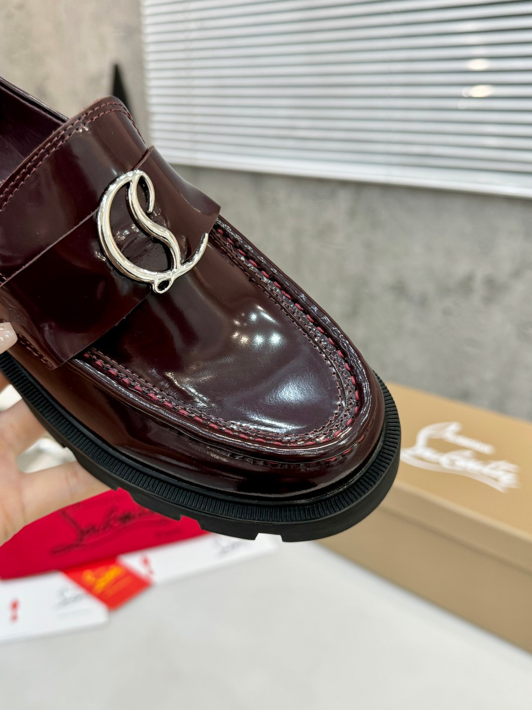 UA Ch**an Louboutin(CL) logo design,the latest runway version of the red-soled shoes