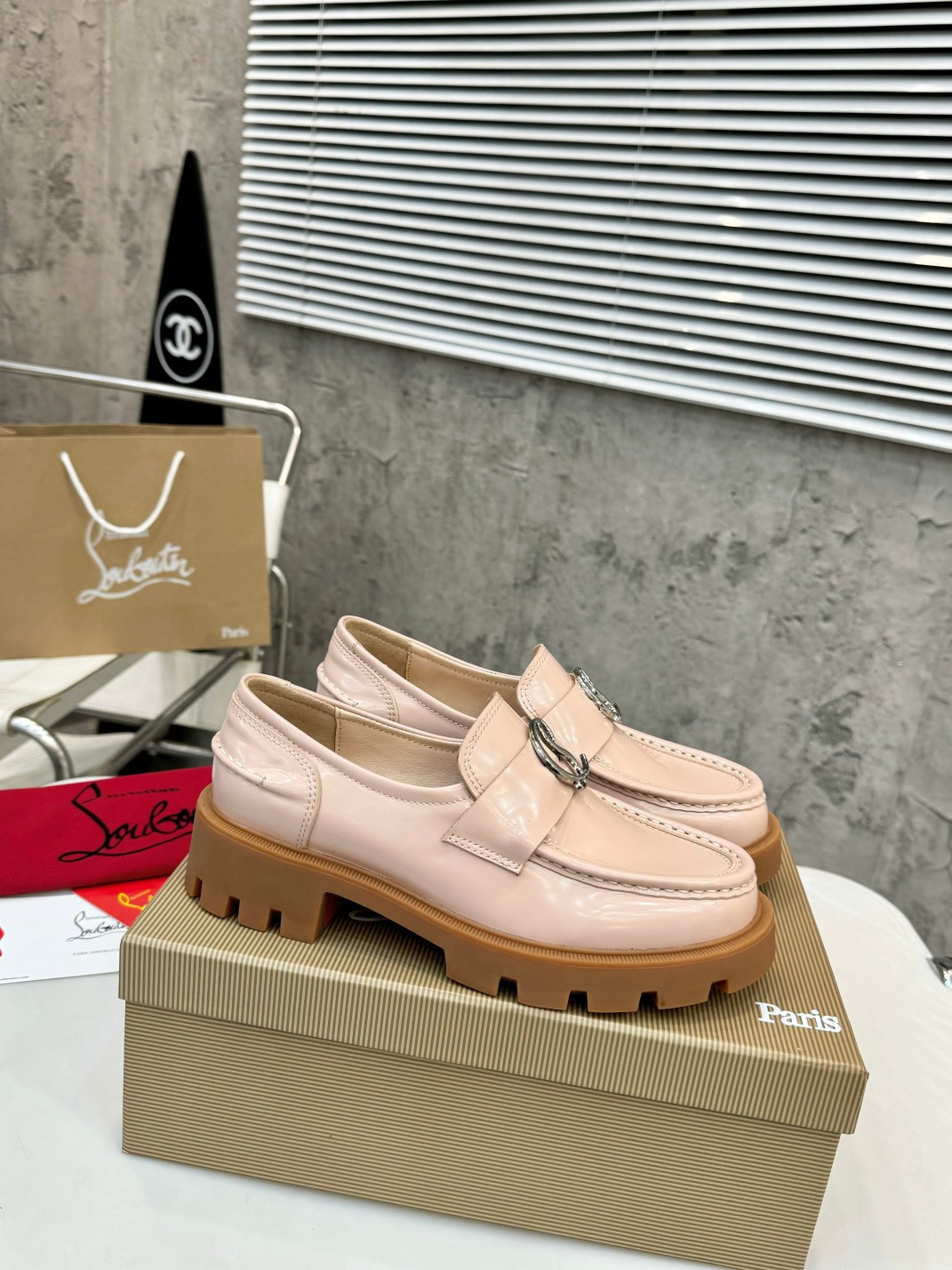 UA Ch**an Louboutin(CL) logo design,the latest runway version of the red-soled shoes