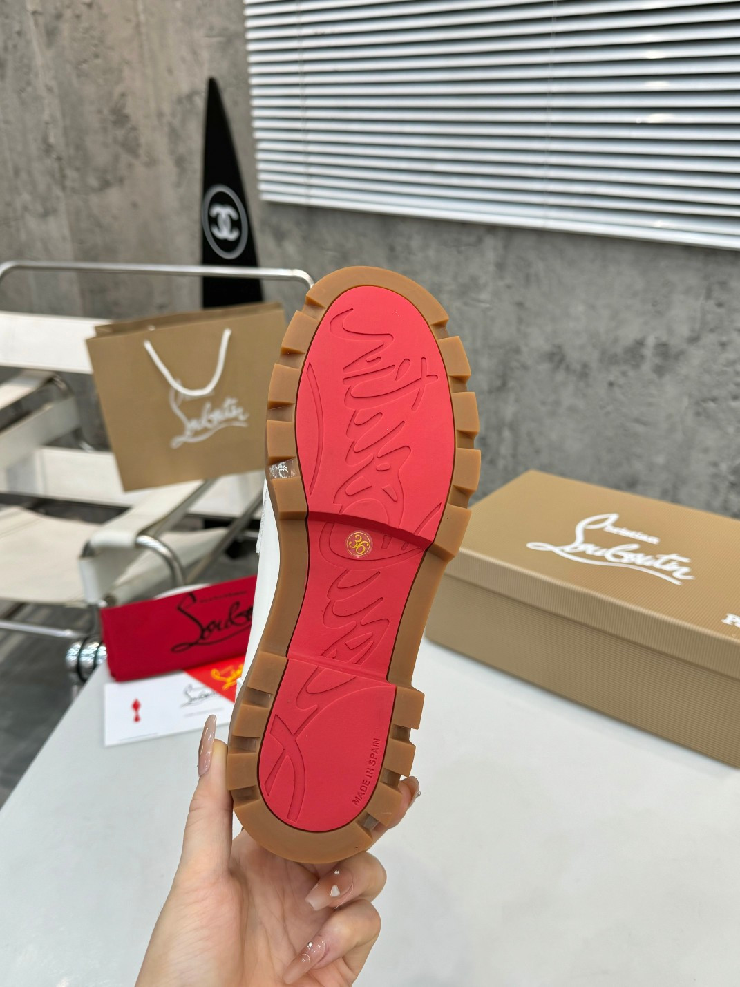 UA Ch**an Louboutin(CL) logo design,the latest runway version of the red-soled shoes