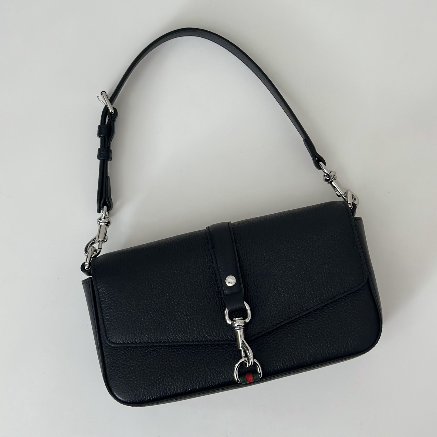 G*u*i Small crossbody bag with hook closure 23.5 x 12.5 x 6.5 cm